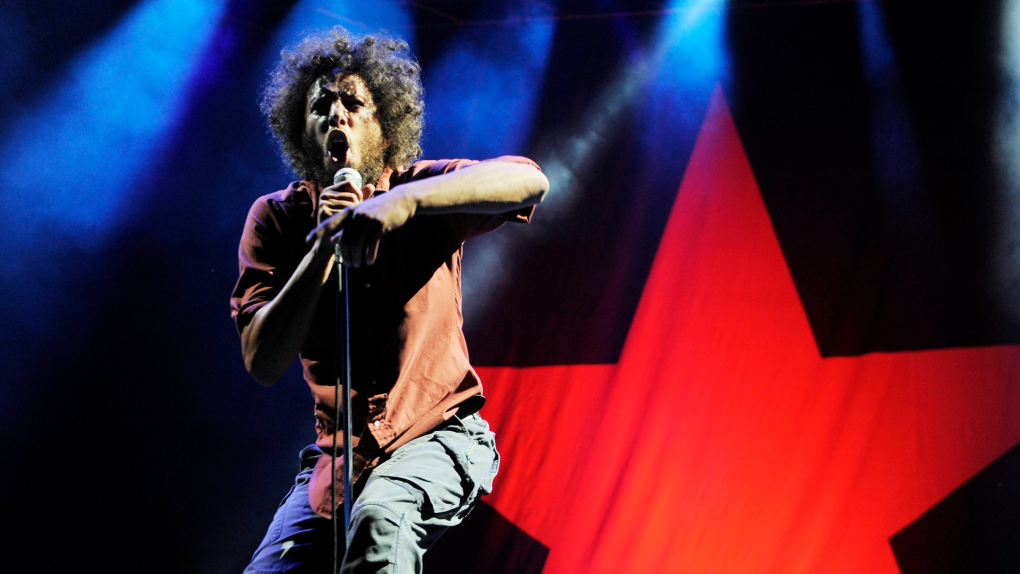 Zack de la Rocha of the band Rage Against the Machine performs during the band's headlining set at the "L.A. Rising" concert at the Los Angeles Coliseum, Saturday, July 30, 2011, in Los Angeles. (AP Photo/Chris Pizzello)