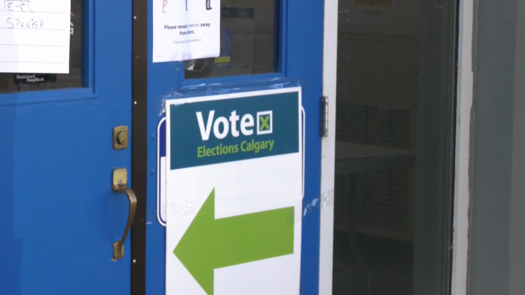 An Elections Calgary sign is seen at a voting station. 