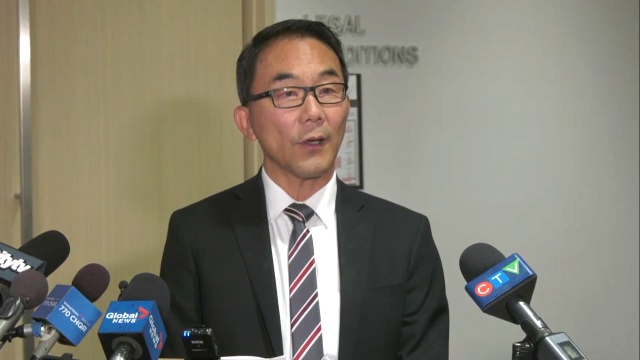 Sean Chu speaks to reporters on Thursday, Oct. 21, 2021 at Calgary city hall. 