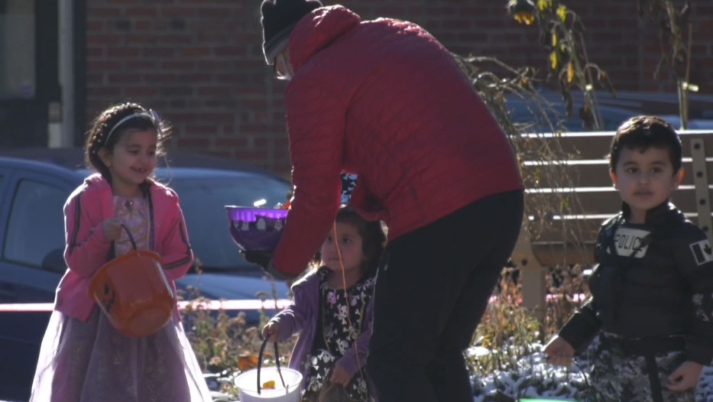 Volunteers and staff at Calgary's Grace Presbyterian Church helped hand out candy to children living near Connaught School and in the Beltline.