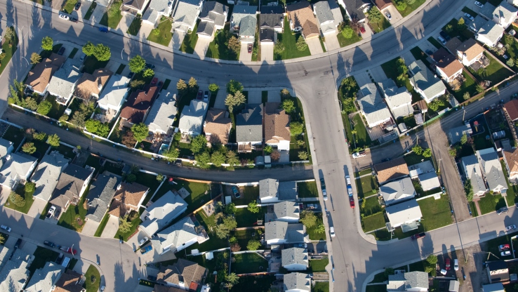 A stock photo shows a suburb with single-family homes in Calgary, Alta. (Getty Images) 