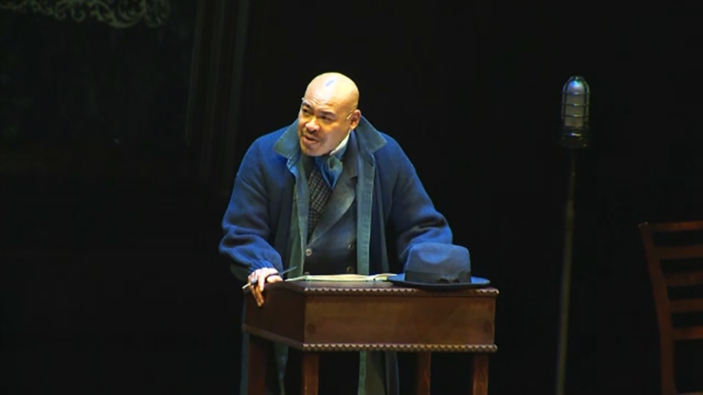 Mike Tan as Scrooge in Theatre Calgary's holiday production of A Christmas Carol