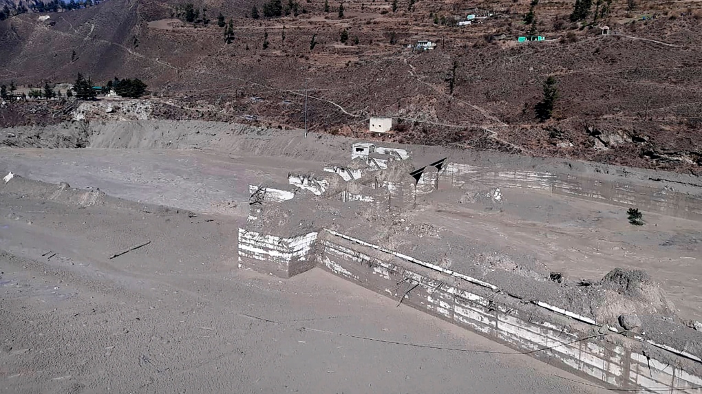 A view of the damaged Dhauliganga hydropower project at Reni village in Chamoli district after portion of Nanda Devi glacier broke off in Tapovan area of the northern state of Uttarakhand, Sunday, Feb.7, 2021. (AP Photo)