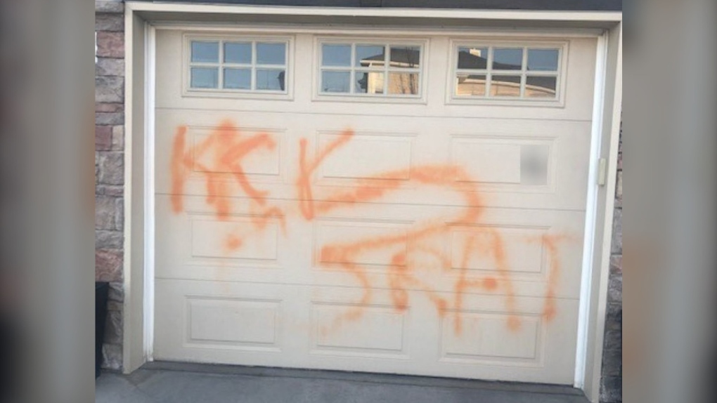Calgary police say a Royal Oak home was tagged with what they say is "hate-motivated" graffiti. (Supplied)