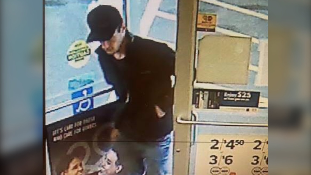 RCMP are attempting to identify the man in this surveillance image in connection with the theft of a car, the use of a stolen debit card and a car prowling in High River. (RCMP)