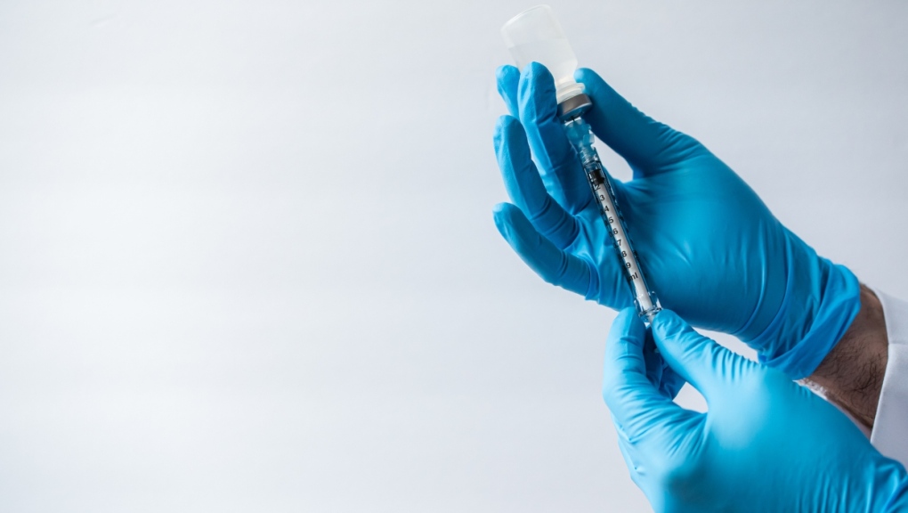 A vaccine is shown in the hands of a health care professional. (Getty Images)