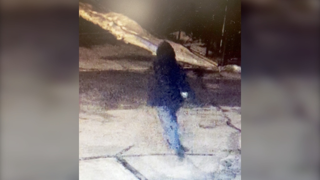 RCMP released this surveillance of a suspect after two windows were broken at a church in the central Alberta town. (RCMP handout)