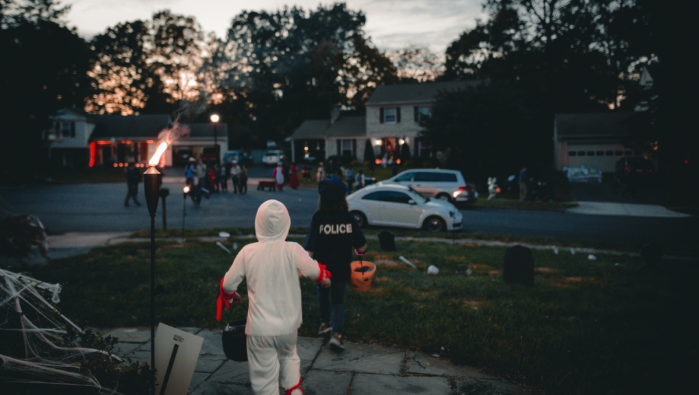 A stock photo of trick-or-treaters on Halloween. (Pexels/Yuting Gao)