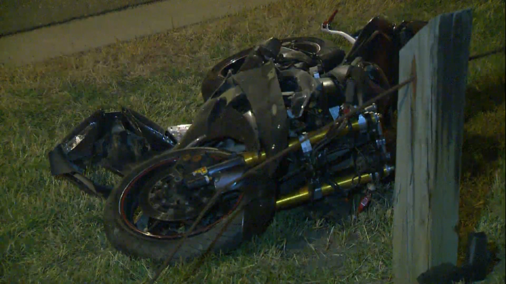 A damaged motorcycle next to a cable barrier following an Oct. 5 crash on 14th Street N.W. near North Haven Drive.