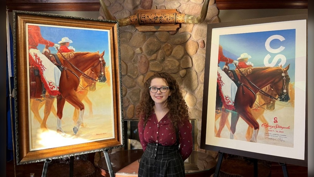 Brooklyn Payne poses next to their painting that was selected as the 2023 Calgary Stampede poster. (supplied: Calgary Stampede)