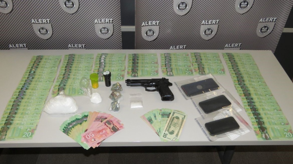 Cash, drugs, cell phones and a gun seized during a targeted Dec. 1 traffic stop outside the city of Brooks. (ALERT)