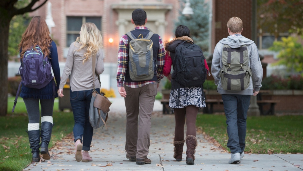 A stock photo showing students walking on a campus. (Getty Images) 