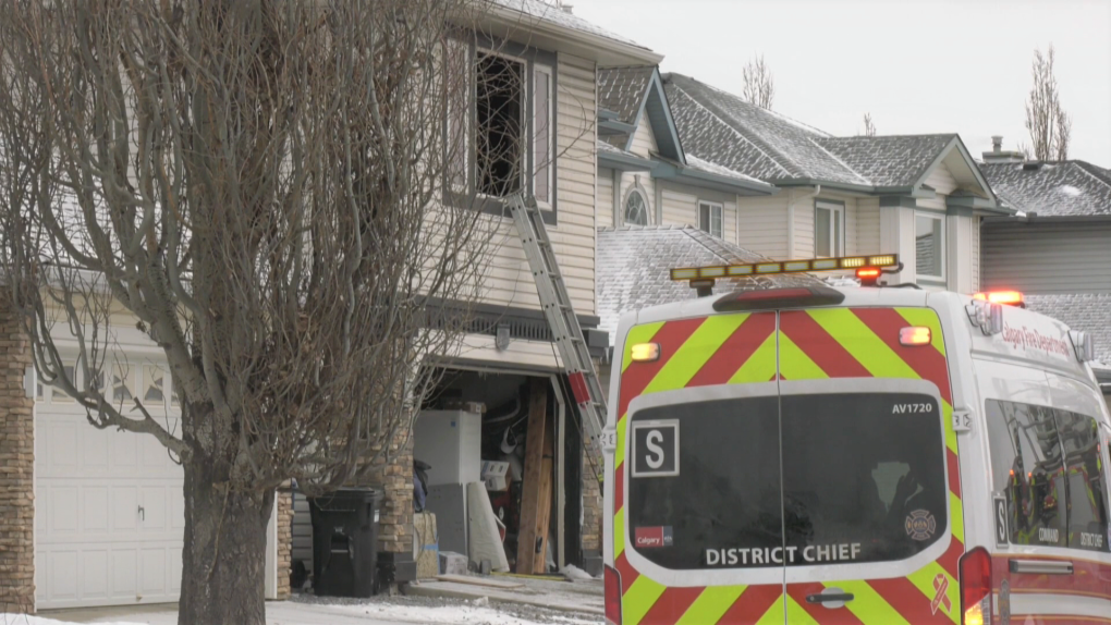 The Calgary Fire Department is shown on scene at a house fire along Douglas Ridge Green S.E. on Friday, Feb. 18, 2022.