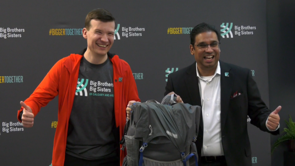 Former Ward 11 Coun. Jeromy Farkas poses with Ken Lima-Coelho, president and CEO of Big Brothers Big Sisters Calgary and Area, ahead of his fundraising run across California, Oregon and Washington.