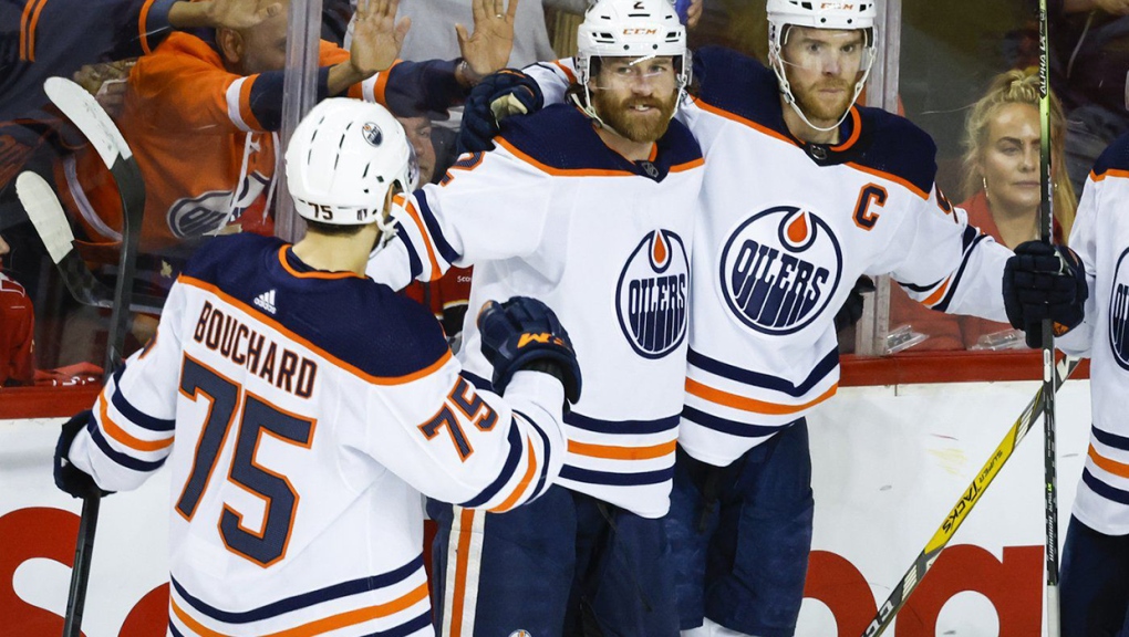 Edmonton Oilers defenceman Duncan Keith, centre left, celebrates his goal with teammates during first period NHL second round playoff hockey action against the Calgary Flames in Calgary, Alta., Friday, May 20, 2022. THE CANADIAN PRESS/Jeff McIntosh