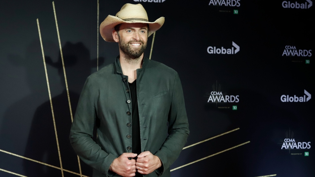 Dean Brody poses on the red carpet at the Canadian Country Music Awards in Calgary, Sunday, Sept. 8, 2019. (THE CANADIAN PRESS/Jeff McIntosh) 