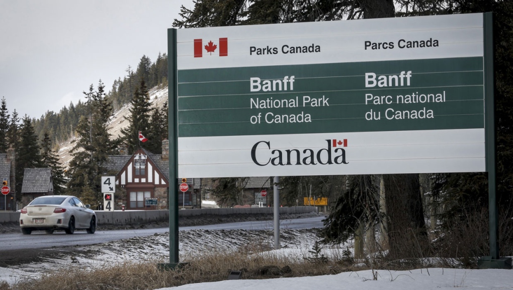The Banff National Park entrance is shown in Banff, Alta., Tuesday, March 24, 2020. Parks Canada says visitors should check for avalanche advisories before heading out on trips into the mountains this spring. THE CANADIAN PRESS/Jeff McIntosh