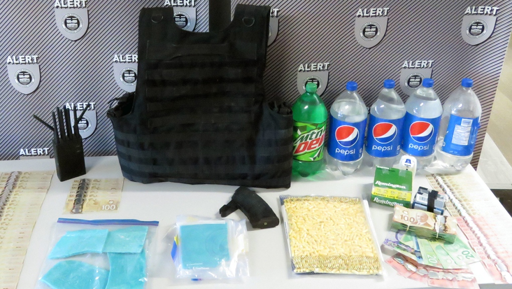 Drugs and cash seized during a traffic stop in the city of Brooks and the search of a home in the village of Empress, Atla. on July 6. (ALERT)