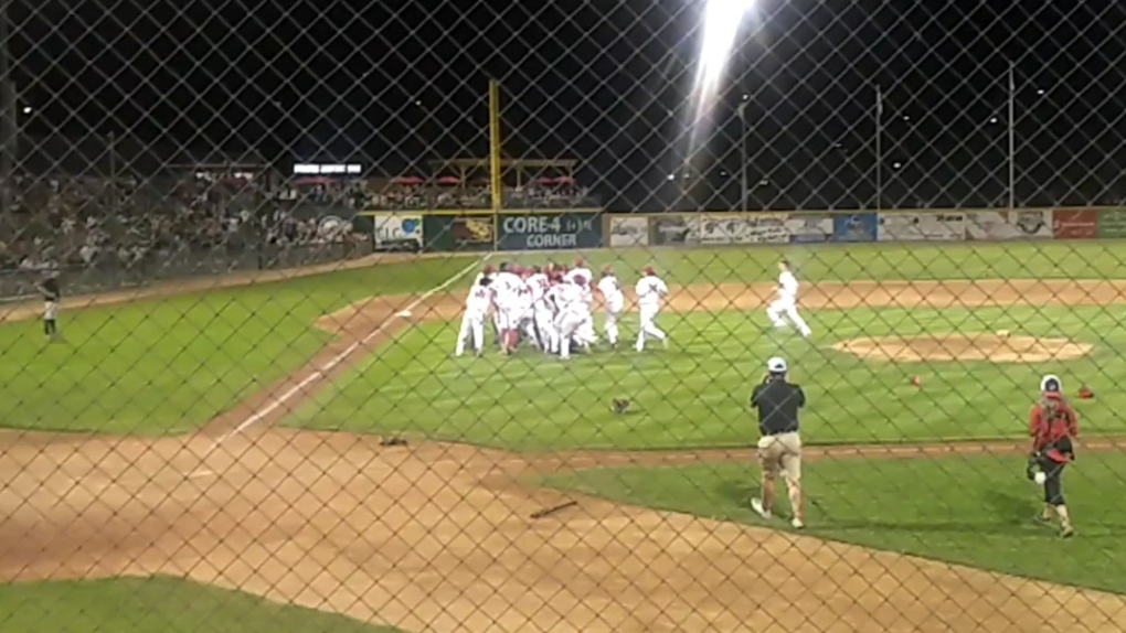 The Okotoks Dawgs storm the field as 2022 WCBL champions after being the Moose Jaw Express 4-1 Thursday night. (supplied)
