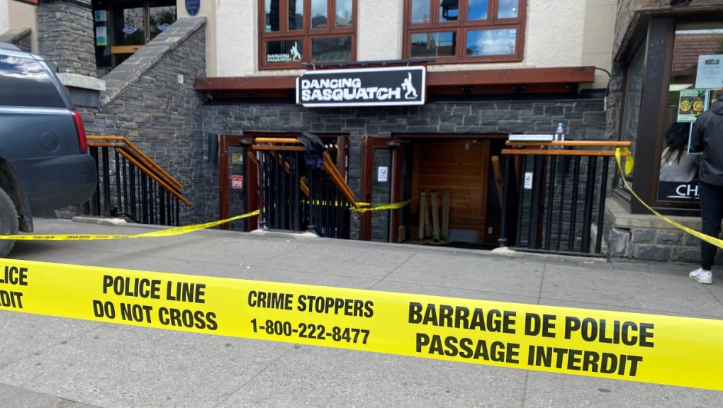 Police tape surrounds the Dancing Sasquatch located at 120 Banff Avenue on Friday, Aug. 5, 2022. 