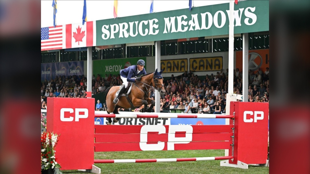 Daniel Deusser, of Germany, rides Killer Queen to win the Spruce Meadows equestrian competition in Calgary, Alta., in a Sunday, Sept. 11, 2022, handout photo. (THE CANADIAN PRESS/HO-Spruce Meadows Media, Mike Sturk)