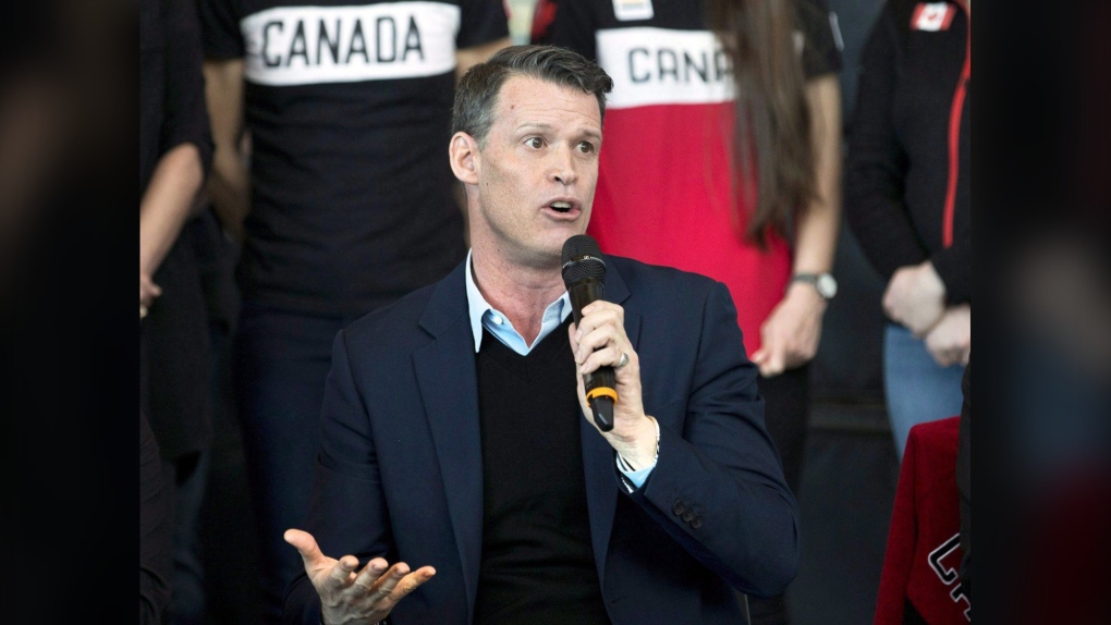 Former Olympic swimmer Mark Tewksbury takes part in a press conference and panel discussion to encourage the city of Calgary to continue a Winter Olympic bid for 2026 in Calgary, Alta., Friday, Apr. 13, 2018. (THE CANADIAN PRESS/Larry MacDougal)