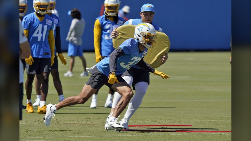 Los Angeles Chargers defensive back Deane Leonard (33) goes through a drill during an NFL football rookie minicamp, Friday, May 13, 2022, in Costa Mesa, Calif. (THE CANADIAN PRESS/AP/Marcio Jose Sanchez)