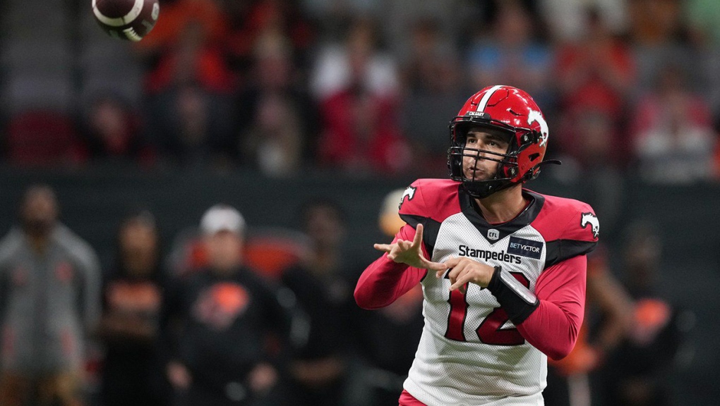 Calgary Stampeders quarterback Jake Maier passes during the first half of CFL football game against the B.C. Lions in Vancouver, on Sept. 24, 2022.  (THE CANADIAN PRESS/Darryl Dyck)