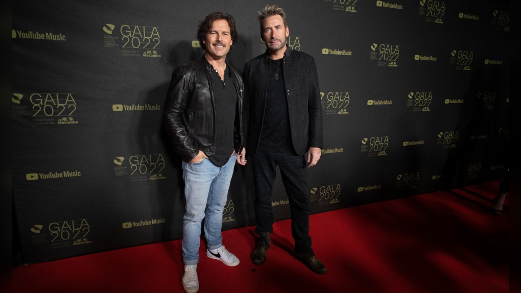Chad Kroeger (right) and Ryan Peake of Nickelback attend the Canadian Songwriters Hall of Fame Gala in Toronto, on Saturday September 24, 2022. (THE CANADIAN PRESS/Chris Young) 