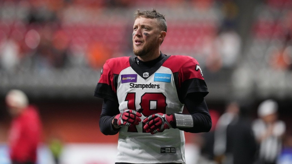 Calgary Stampeders quarterback Bo Levi Mitchell warms up before the CFL western semi-final football game against the B.C. Lions in Vancouver on Sunday, November 6, 2022. The Hamilton Tiger-Cats announced Tuesday that Mitchell has signed a three-year deal with the club. (THE CANADIAN PRESS/Darryl Dyck)