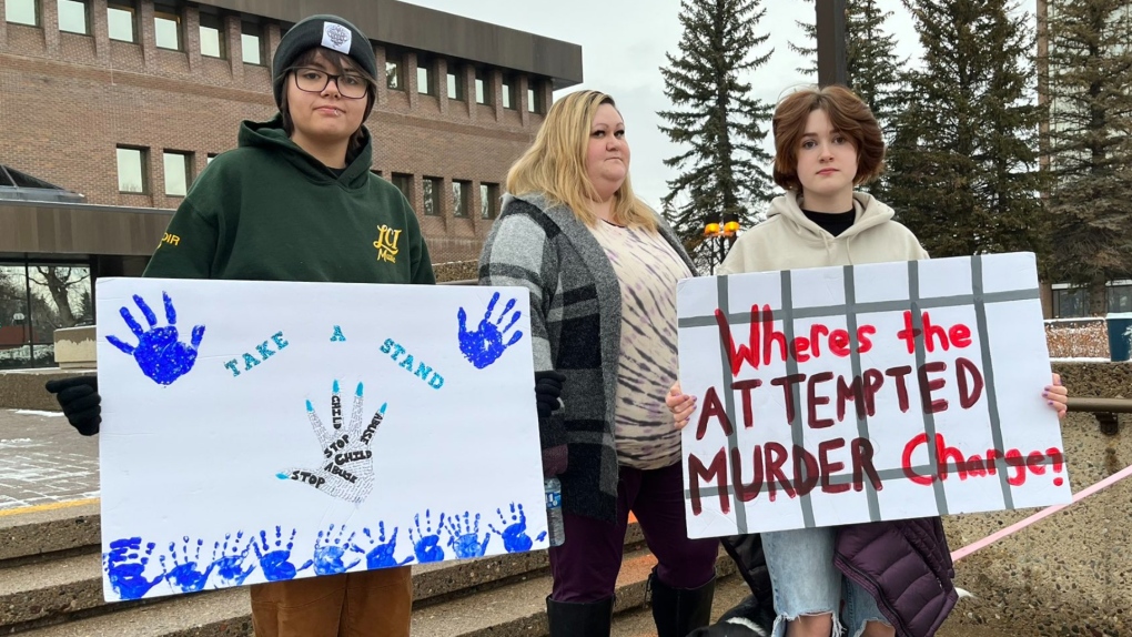 Roughly two dozen people gathered outside of the Lethbridge courthouse on Jan. 27 ahead of the bail hearing, which was later delayed, for parents charged in connection with the sexual assault of their six-week-old daughter.