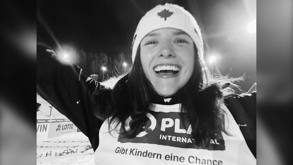 Abigail Strate of Calgary celebrates after finishing third at World Cup ski jumping event in Germany Saturday. (Photo: Twitter@abi_strate)