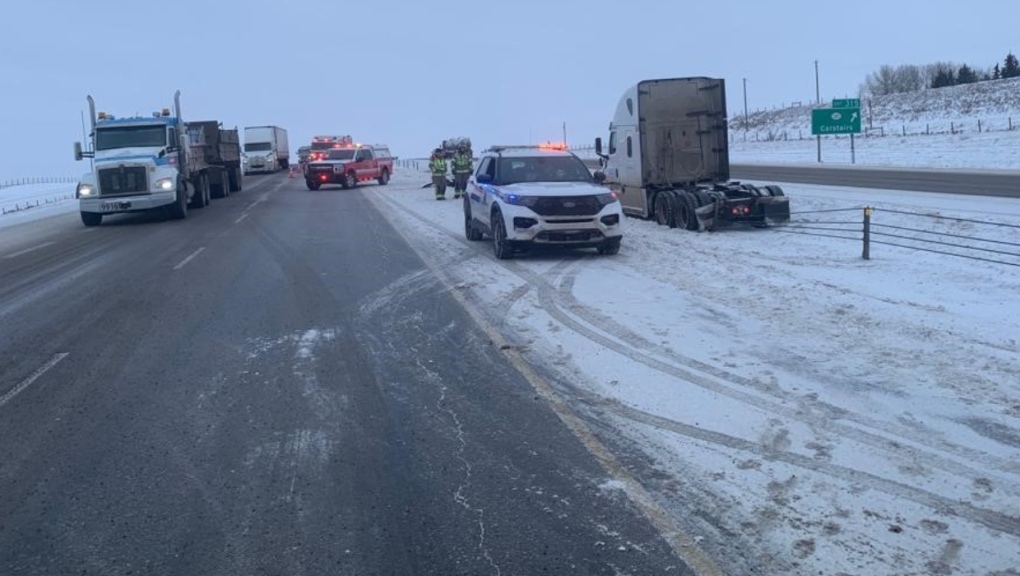 Airdrie RCMP respond to a collision on the QEII Highway near Carstairs, Alta., on Monday, Jan. 30, 2023. (RCMP handout) 