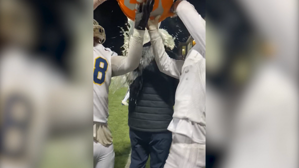 Video provided by the Ernest Manning Griffins football team shows head coach Garth Melrose getting a Gatorade shower after winning the provincial football championship. 