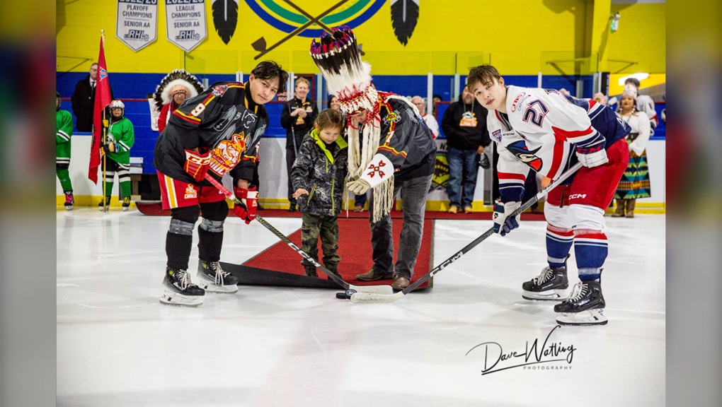 A ceremonial face-off was held to celebrate the first AJHL regular-season game played at Deerfoot Sportsplex at Siksika Nation Wednesday night. (Photo: X@Dave__Watling)