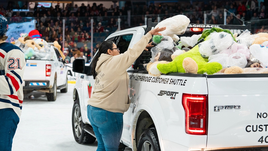 Hurricanes fans help load up the team truck Friday with teddy bears.(Photo: X@WHLHitman/KortWoychesin)