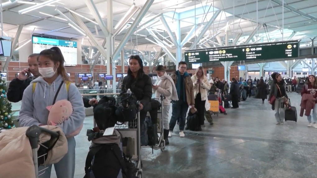 Travellers keep their eyes on the skies