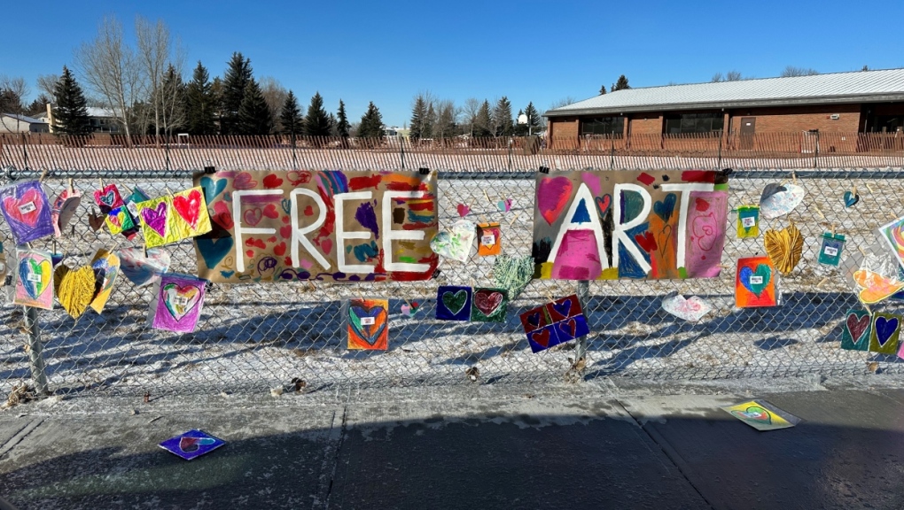 Artwork up for grabs outside of Lethbridge's Children of St. Martha school at 206 McMaster Blvd. West on Feb. 14, 2023.