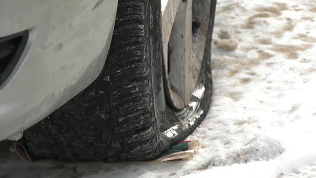 Tires were slashed on a dozen vehicles on one street in northeast Calgary Thursday night.