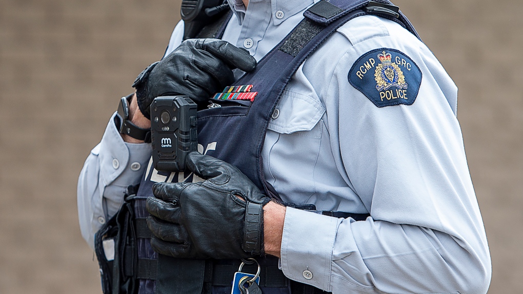 An RCMP officer wears a body camera at the detachment in Bible Hill, N.S., on Sunday, April 18, 2021. A Calgary criminologist says Alberta's plan to make all police services in the province use body cameras could come with prohibitive costs and take a long time to put in place. THE CANADIAN PRESS/Andrew Vaughan