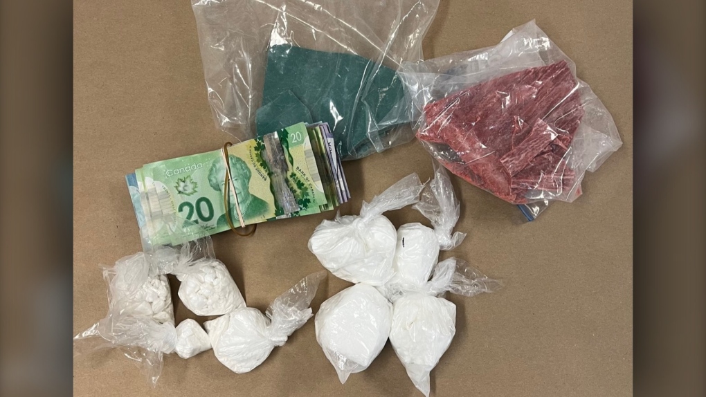 Drugs and cash seized during the March 23 search of a northside Lethbridge home that resulted in charges against an Edmonton man. (LPS)