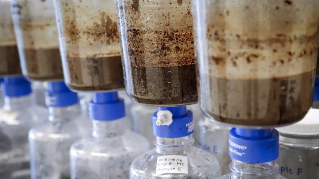 Tailings samples are being tested during a tour of Imperial's oilsands research centre in Calgary on Tuesday, Aug. 28, 2018. (THE CANADIAN PRESS/Jeff McIntosh)