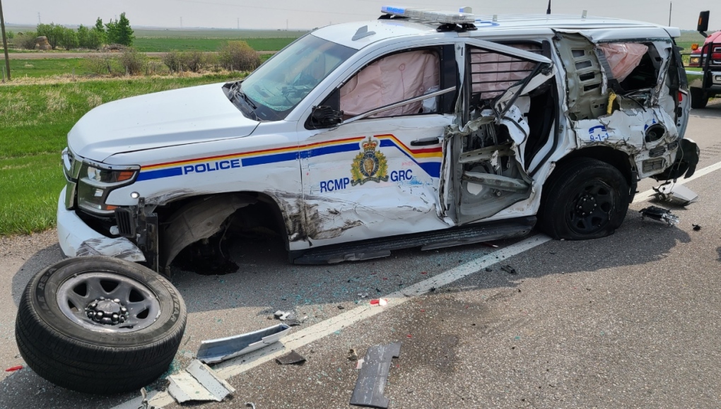 A RCMP officer from Claresholm, Alta. suffered minor injuries on May 19, 2023 when their vehicle was hit by a semi during a traffic stop. (RCMP handout) 