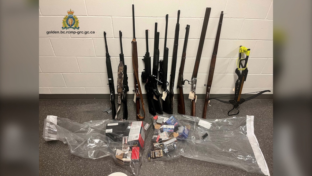 Firearms and ammunition seized by Golden-Field RCMP officers. Two people face charges. (Photo courtesy Golden-Field RCMP)