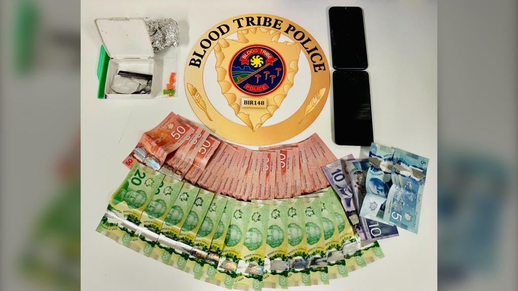 Blood Tribe police seized drugs and cash from a woman on May 31, 2023. She is facing drug trafficking and drug possession charges. (Supplied/BTPS)