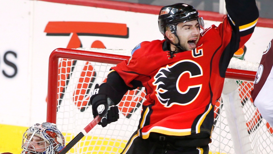 Calgary Flames' Mark Giordano, right